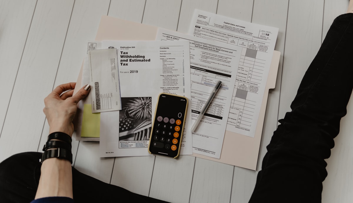 Insurance documents and checklist on desk