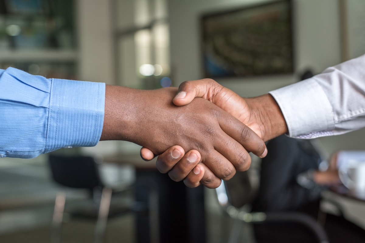 Handshake finalizing insurance deal