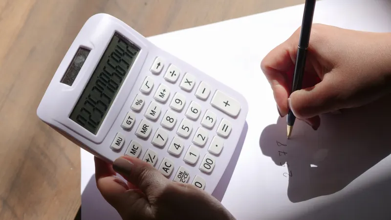 Car keys and insurance documents on desk