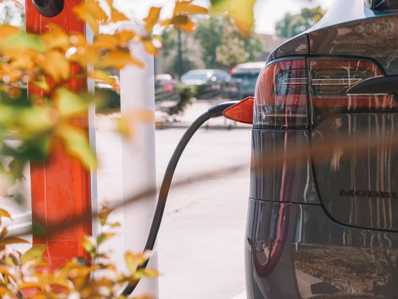 Electric car charging at station