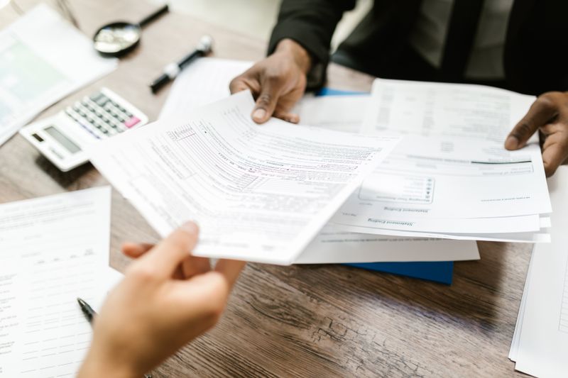 Person reviewing financial documents