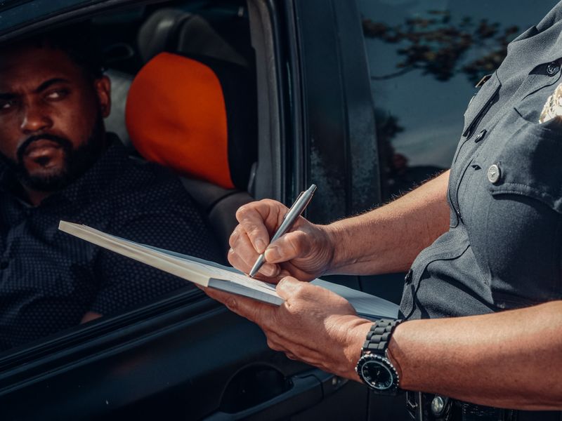 speeding ticket on a car dashboard
