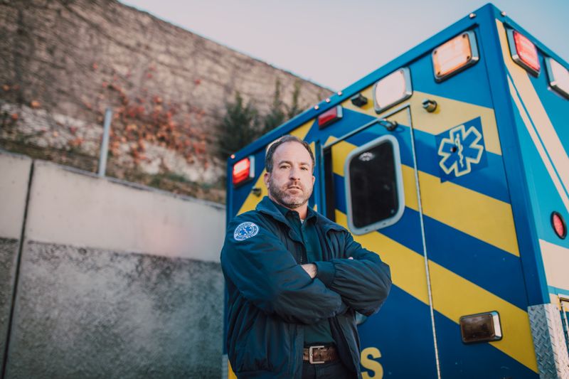 paramedic treating a patient