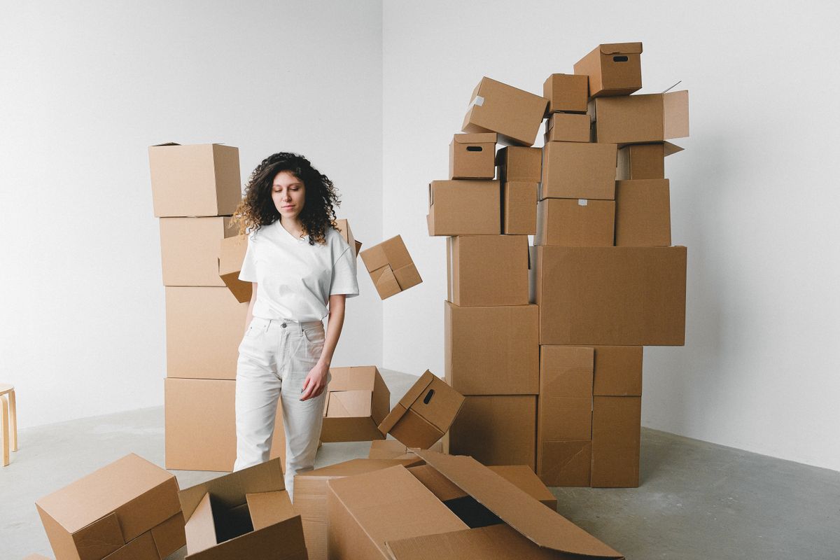Student packing for move
