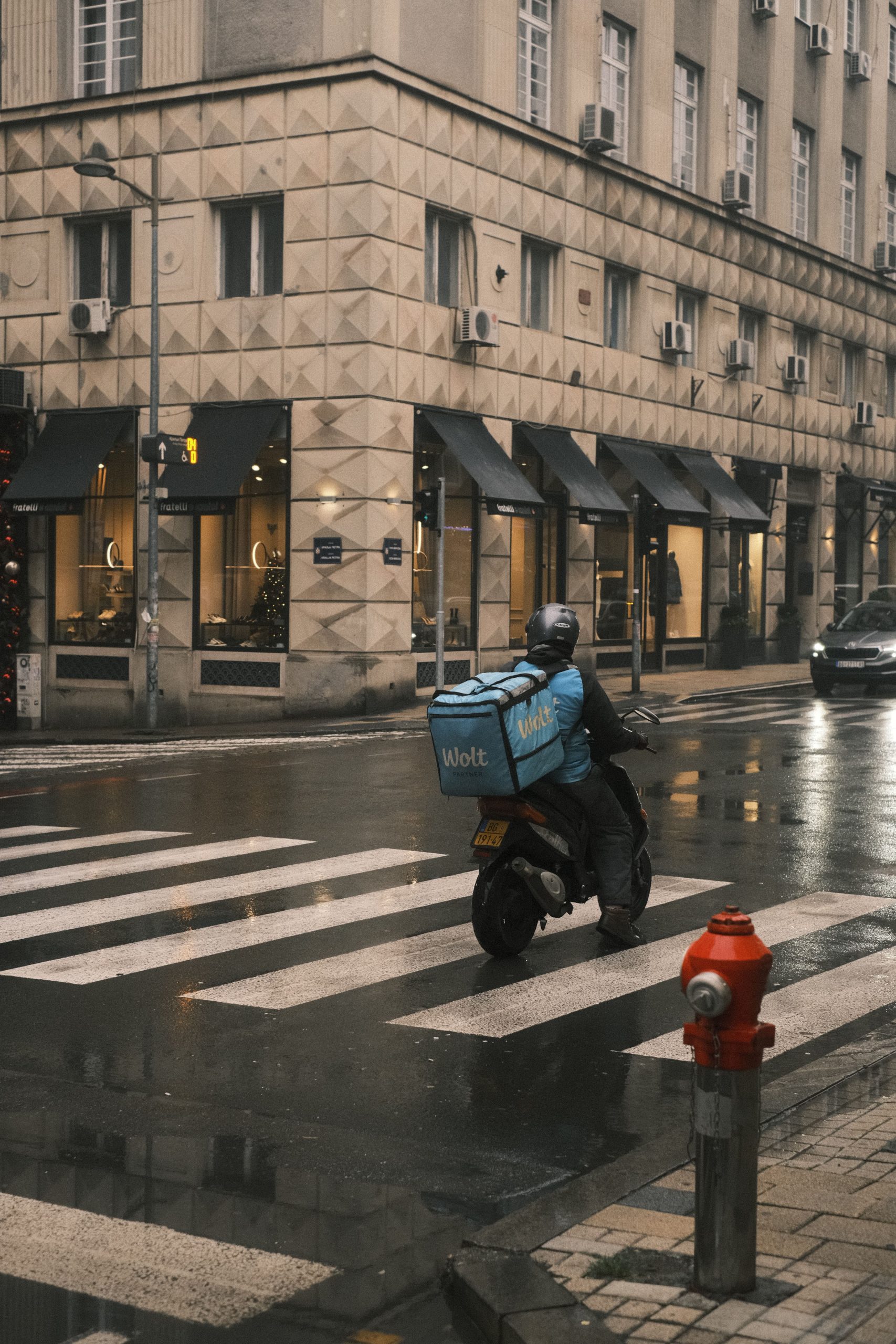 Delivery driver on scooter