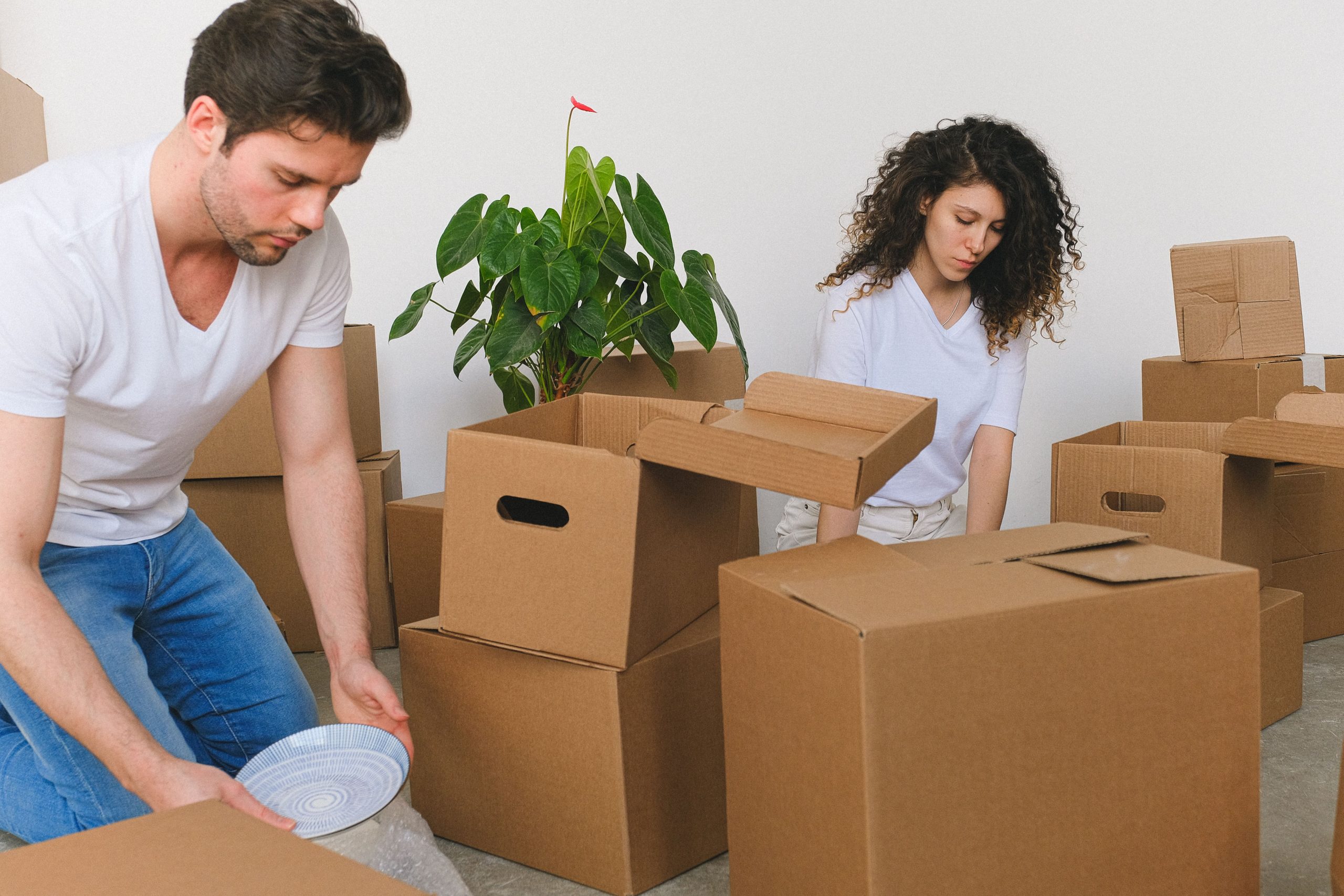 Student packing belongings for a relocation