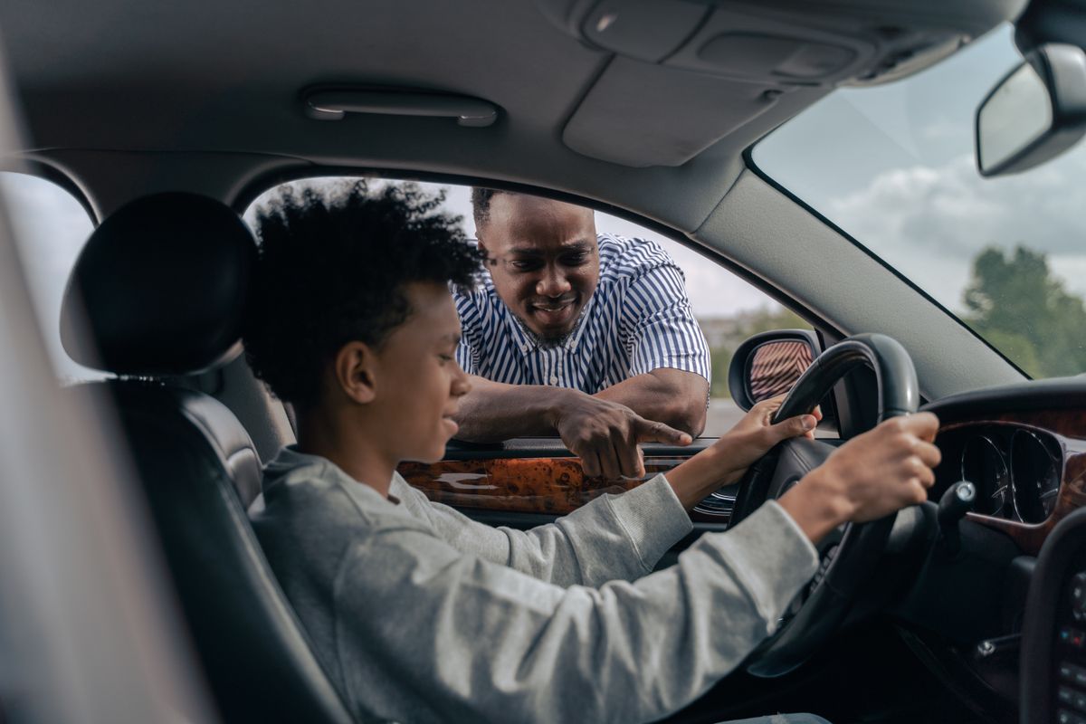 16-year-old high school student at the car